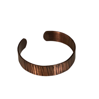 Bronze bracelet on a white background