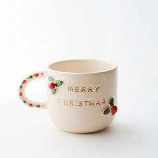 Mug with 'Merry Christmas' text on a white background