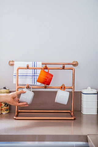 Copper Cup Stand – Industrial Display with Artisanal Charm
